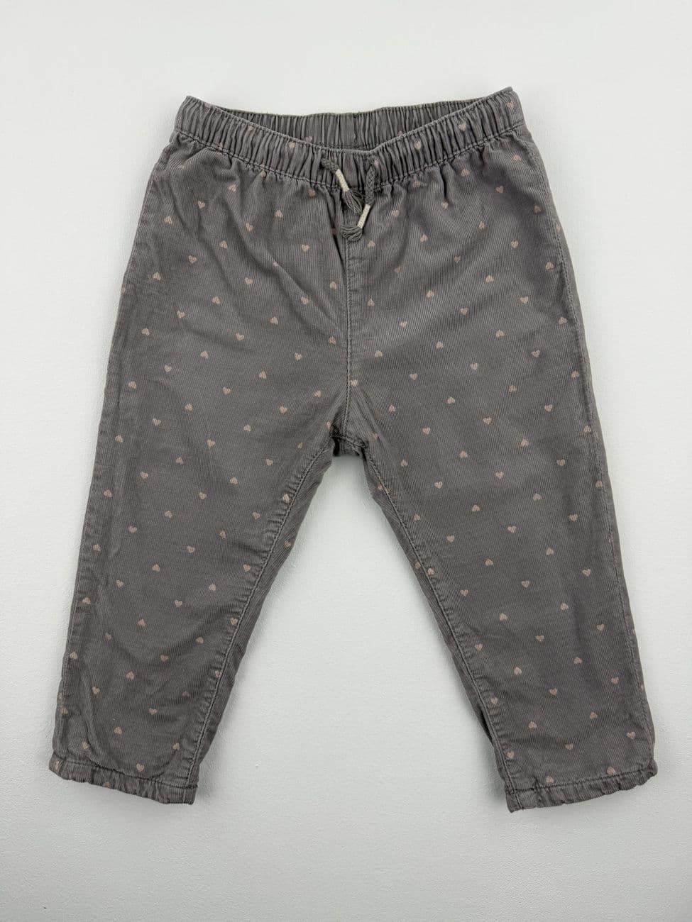 Pantalón de terciopelo gris con estampado de corazones rosas – H&M – 80 cm